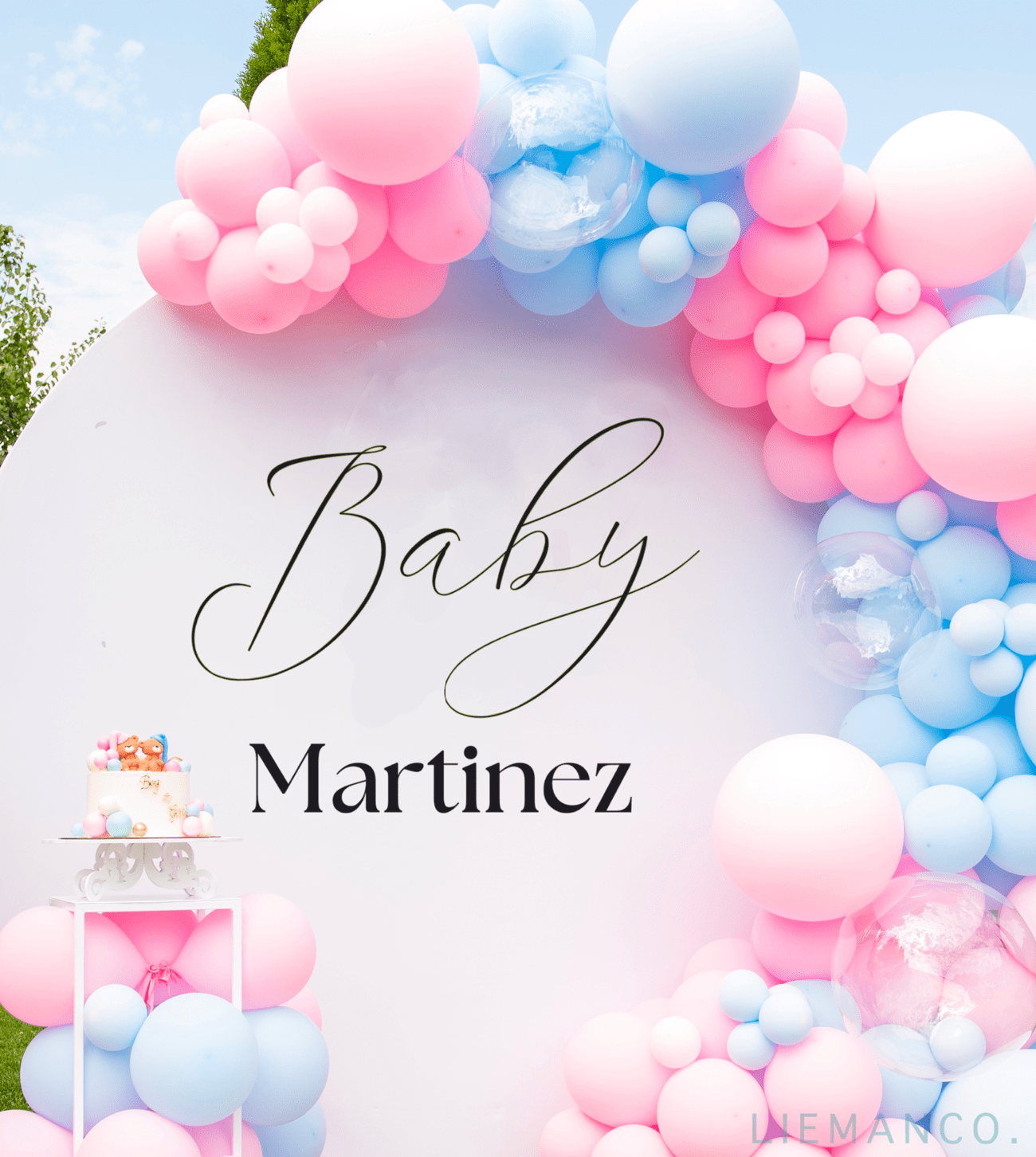 Custom baby shower vinyl decal with the Baby's Last Name. Designed for use as a central piece of a backdrop for a gender reveal or baby shower party. The decal is presented on a round acrylic sign, framed by pastel pink and blue balloons